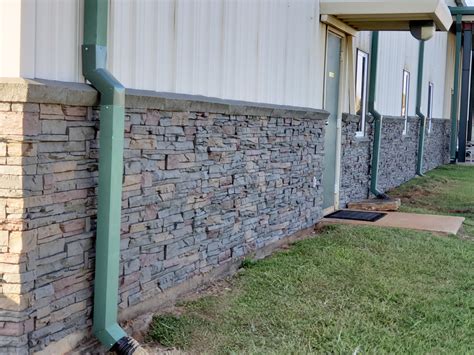 faux stone metal building panels